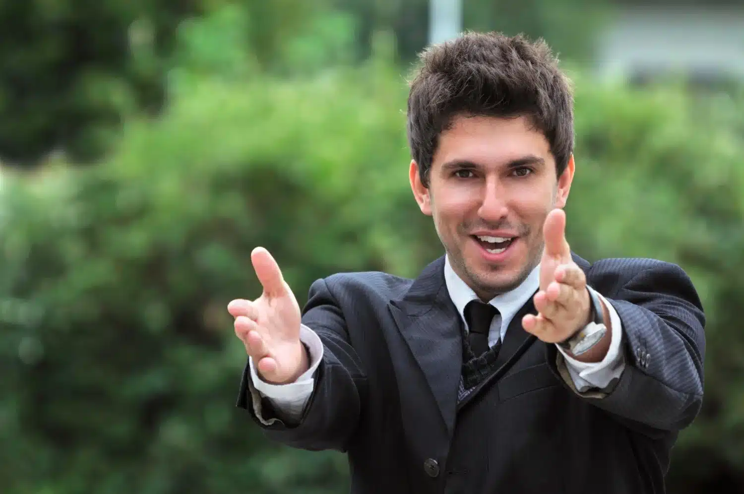 Man pointing forward showing neck discomfort from poor posture