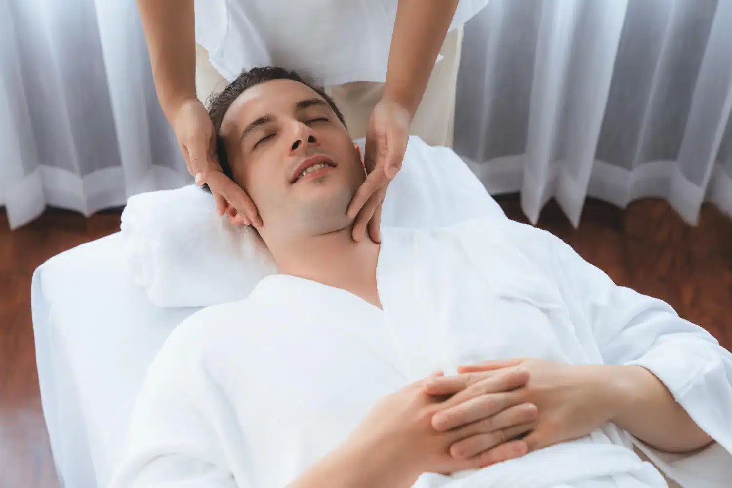 Person receiving relaxing massage therapy to reduce stress and anxiety