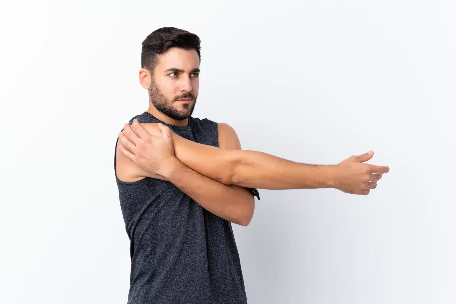 Man performing a gentle shoulder mobility exercise with arms extended